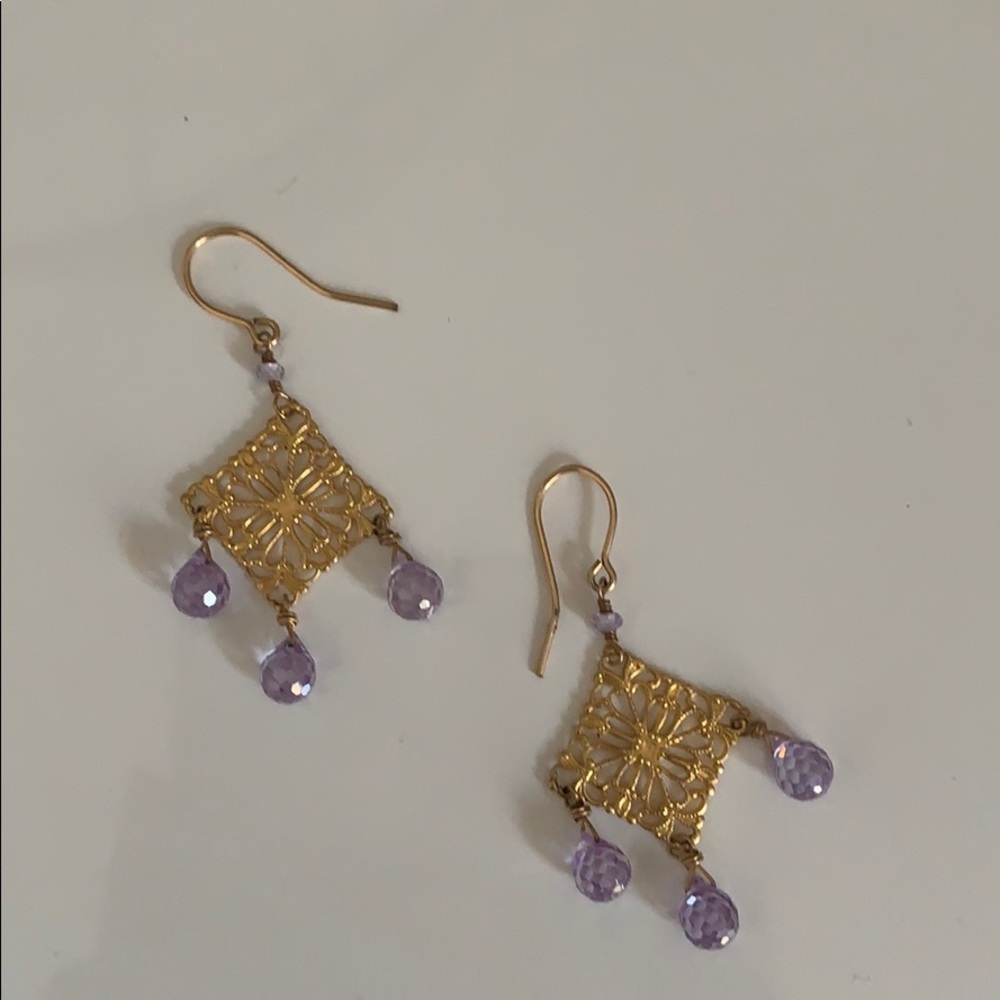 Earrings with purple stones